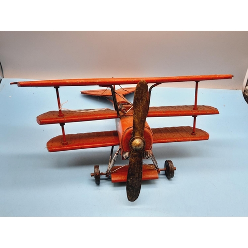 32 - Tin Plate Model of a WWI German (Red Baron) Plane. 18cm High, 35cm x 37cm.