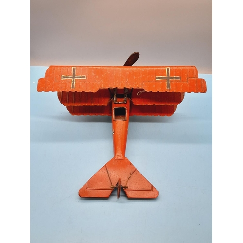 32 - Tin Plate Model of a WWI German (Red Baron) Plane. 18cm High, 35cm x 37cm.