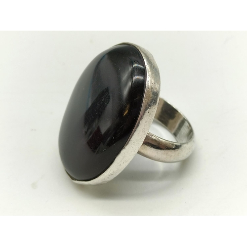 360 - 925 Silver and Oval Onyx Ring. Size Q. Boxed.