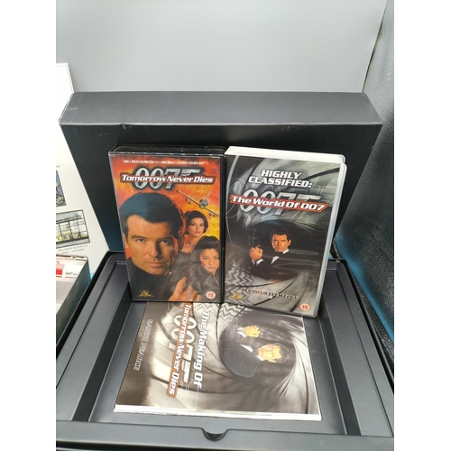 405 - James Bond Limited Edition Video Box Set plus 3 Tins of 007 Trading Cards.