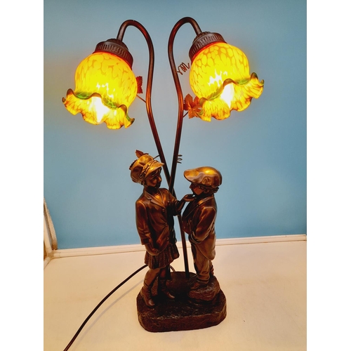 77 - Cold Cast 'Boy and Girl' Two Branch Lamp with Shades W/O. 57cm High.