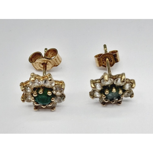 61 - Pair of 9ct Gold Clear and Green Stone Earrings.