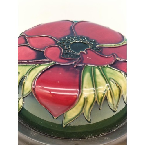 38 - Moorcroft 'Anemone' Paperweight on Wooden Base. 11cm Diameter.