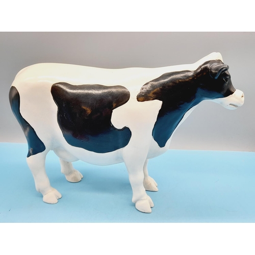 12 - Resin Friesian Cow Butcher Display. 23cm high, 33cm x 10cm.