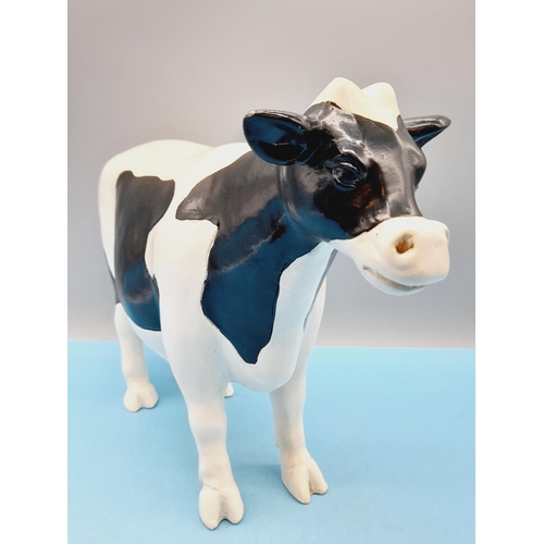 12 - Resin Friesian Cow Butcher Display. 23cm high, 33cm x 10cm.