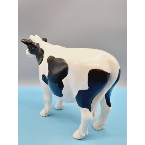 12 - Resin Friesian Cow Butcher Display. 23cm high, 33cm x 10cm.