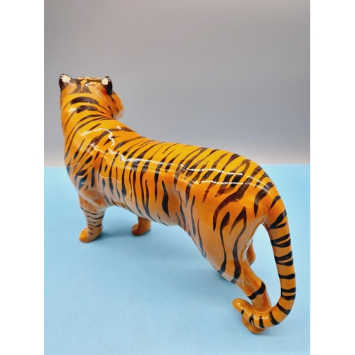 19 - Beswick Figure of a Tiger. 19cm High x 29cm Long.