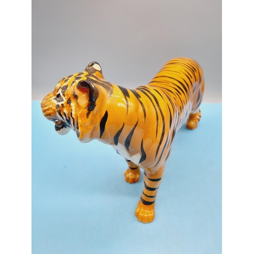 19 - Beswick Figure of a Tiger. 19cm High x 29cm Long.