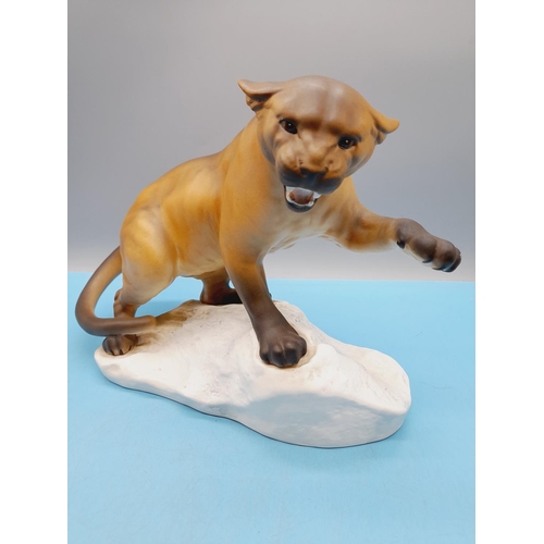 22 - Beswick Figure of a Puma on a Rock. 21cm High, 31cm x 13cm.