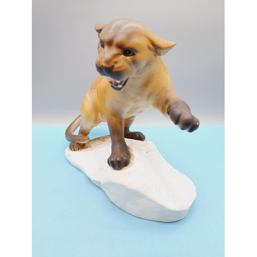 22 - Beswick Figure of a Puma on a Rock. 21cm High, 31cm x 13cm.