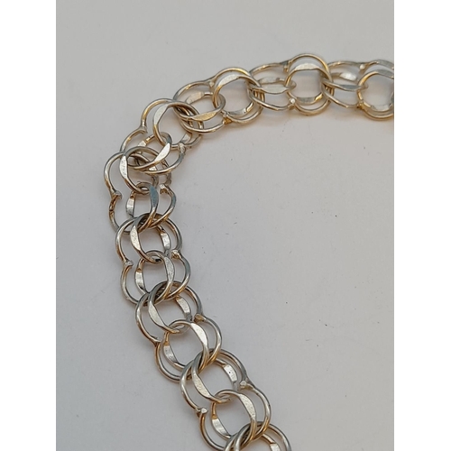 28 - Silver Hallmarked (London) Padlock Bracelet. 8.25g