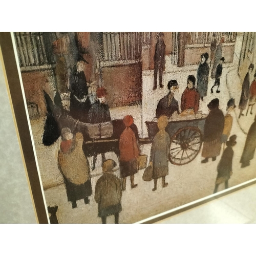 35 - Framed L.S.Lowry Print 'The Hawker's Cart'. 79cm x 63cm. Collection Only.