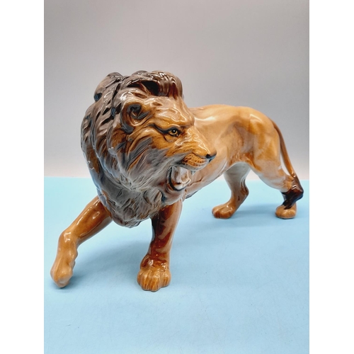 41 - Beswick Figure of a Lion. 17cm High x 28cm.