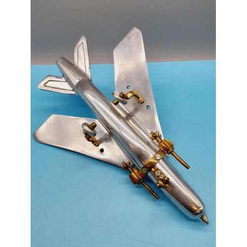 9 - Aluminium and Brass War Plane. 15cm High, 36cm x 28cm.