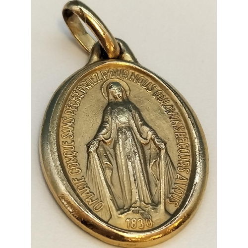 12 - Unmarked (Tested) 9ct Gold Virgin Mary Pendant. 3.4 Grams.