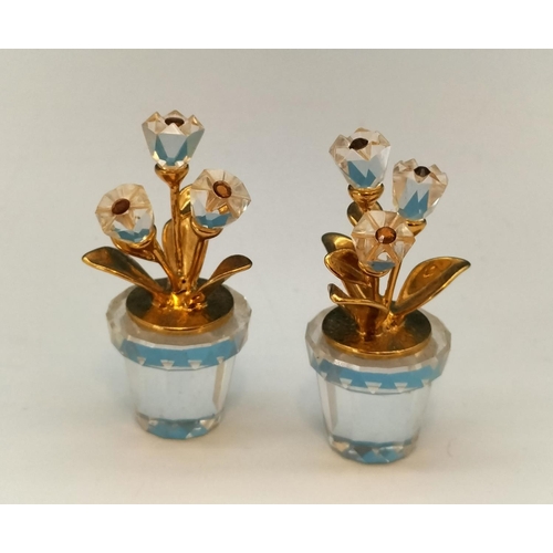 139 - 2 x Swarovski Crystals Memories Flowers in Pots with Gold Tone Leaves. 4cm High.