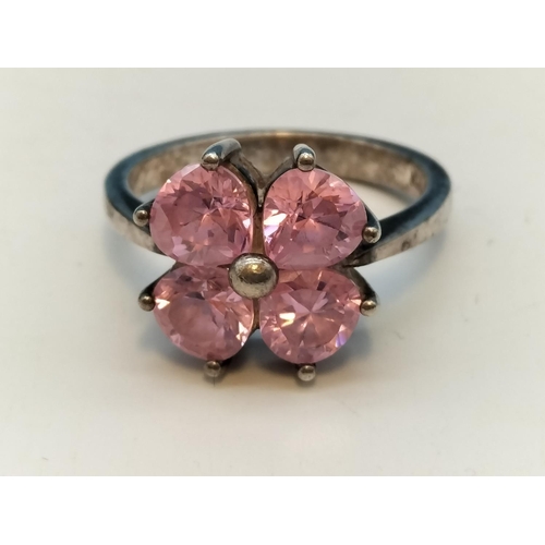 231 - 925 Silver Rings (2) - Pink 4 Stone (Size O) and Clear Stone (Size L).