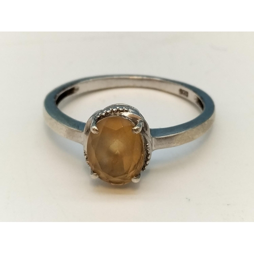 281 - Silver 925 and Yellow Stone Ring. Size R.