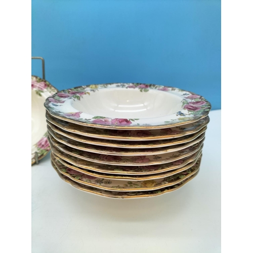 310 - Royal Doulton 16cm Dessert Bowls (10) in the 'English Rose' Pattern.