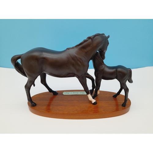 5 - Royal Doulton Figure of Black Beauty and Foal on Wooden Plinth. 20cm High, 30cm x 11cm.