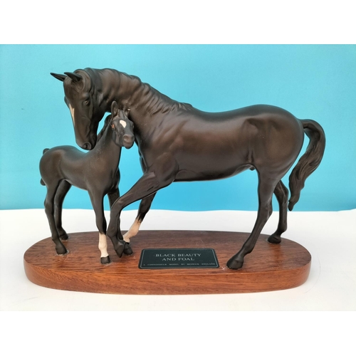 514 - Beswick Figure of Black Beauty and Foal on Plinth. A/F Repair to Leg and Ear. 20cm High, 30cm x 10cm... 