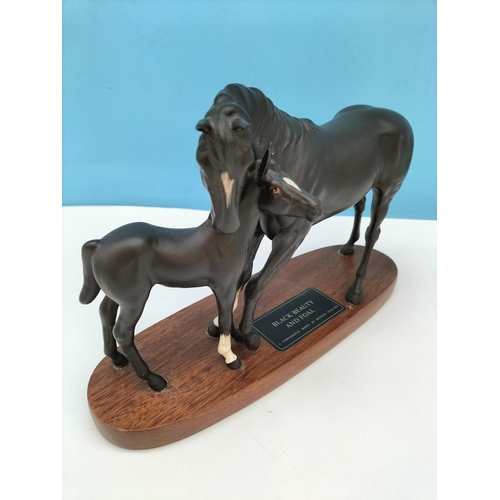 514 - Beswick Figure of Black Beauty and Foal on Plinth. A/F Repair to Leg and Ear. 20cm High, 30cm x 10cm... 