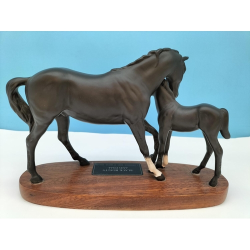 514 - Beswick Figure of Black Beauty and Foal on Plinth. A/F Repair to Leg and Ear. 20cm High, 30cm x 10cm... 