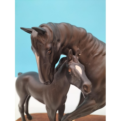 514 - Beswick Figure of Black Beauty and Foal on Plinth. A/F Repair to Leg and Ear. 20cm High, 30cm x 10cm... 