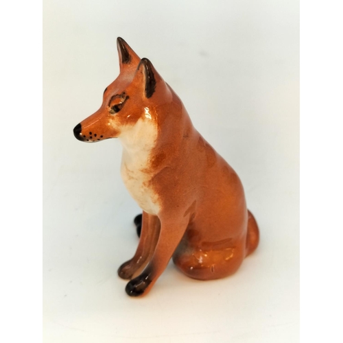 63 - Beswick 8cm Figure of a Seated Fox.