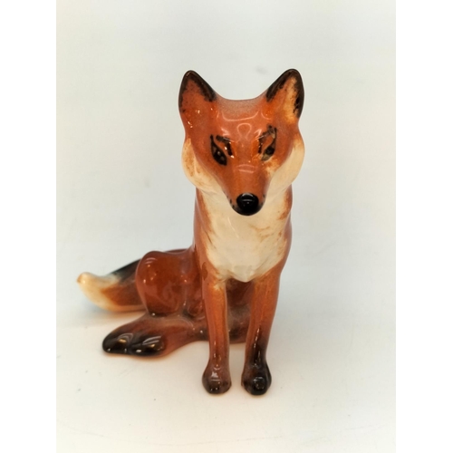 63 - Beswick 8cm Figure of a Seated Fox.