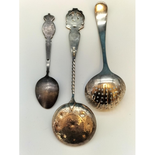 245 - 3 x Antique White Metal Spoons, a Sifter, Caddy and Enamelled Souvenir Spoon.