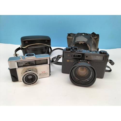 95 - Collection of Cameras to include Yashica Electro 35 Automatic with Yashinon DX Lens, Halina Simlette... 