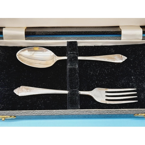 23 - Cased Silver Hallmarked Fork and Spoon Sets (2) 84 Grams.