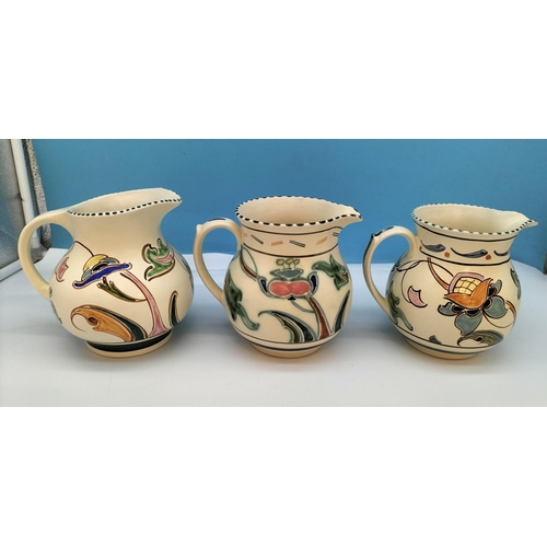 284 - Honiton Pottery (1947-1956) Jugs (3) plus Vase. Tallest 16cm.