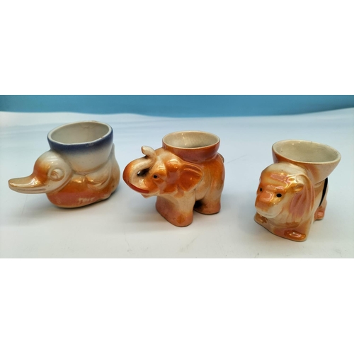 292 - Vintage Lustre Ware Animal Egg Cups (9) to include Elephants, Lion, Rabbit, etc.