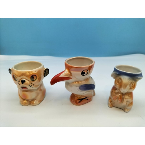 292 - Vintage Lustre Ware Animal Egg Cups (9) to include Elephants, Lion, Rabbit, etc.