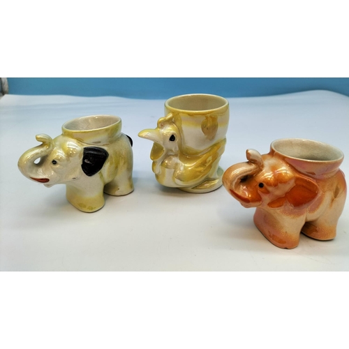 292 - Vintage Lustre Ware Animal Egg Cups (9) to include Elephants, Lion, Rabbit, etc.