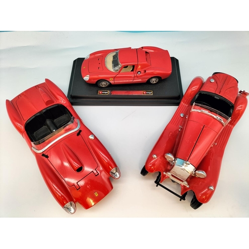 562 - Burago Die-Cast Cars (3) to include Ferrari and Alfa Romeo. Largest 8cm High, 25cm x 10cm.