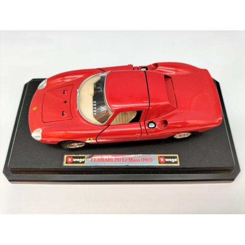 562 - Burago Die-Cast Cars (3) to include Ferrari and Alfa Romeo. Largest 8cm High, 25cm x 10cm.