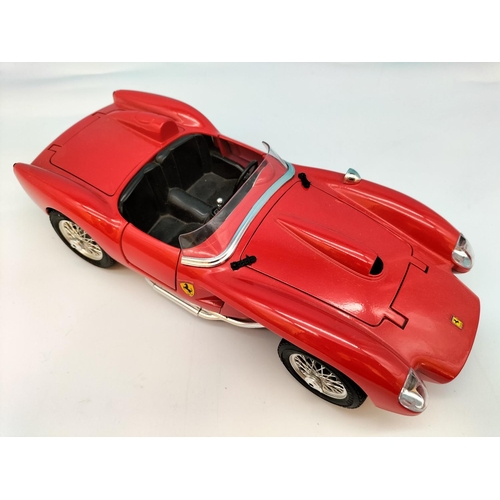 562 - Burago Die-Cast Cars (3) to include Ferrari and Alfa Romeo. Largest 8cm High, 25cm x 10cm.