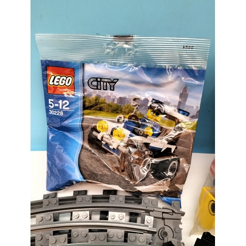 574 - Box of Mixed Lego Pieces to include Trains, Track, Bag of Mixed Wheels, etc.