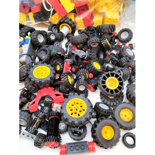 574 - Box of Mixed Lego Pieces to include Trains, Track, Bag of Mixed Wheels, etc.