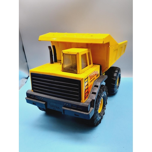 72 - Large c1980's XMB 975 Turbo Diesel Tipper Truck. 26cm High, 43cm x 20cm.