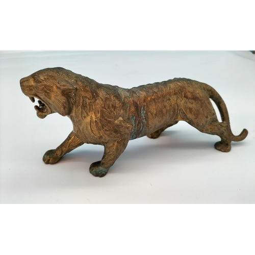 76 - Brass Figure of a Tiger. 10cm High, 25cm Long.