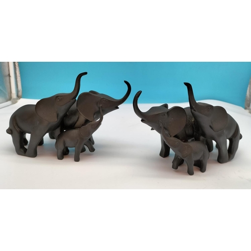 77 - Pair of Ceramic Elephant Figures. 14cm High x 23cm Each.