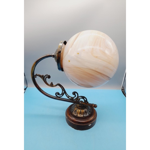 478 - Wall Mount Cast Metal Globe Light with Marbled Effect Glass Globe. 29cm High, 38cm x 20cm.