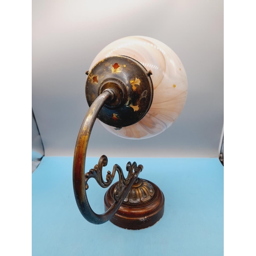 478 - Wall Mount Cast Metal Globe Light with Marbled Effect Glass Globe. 29cm High, 38cm x 20cm.