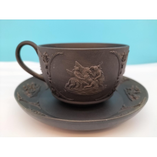 437 - Wedgwood Black Basalt Cup and Saucer with Classical Design.