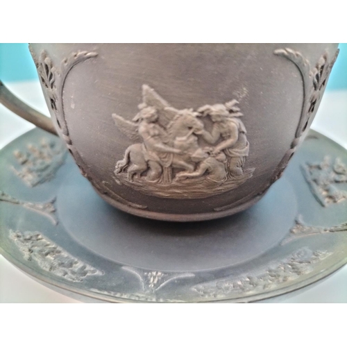 437 - Wedgwood Black Basalt Cup and Saucer with Classical Design.