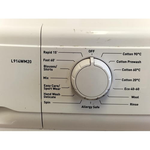 619 - Logik Washing Machine. Model L914WM20. Vendors Description W/O. 85cm High, 60cm x 60cm. Collection O... 